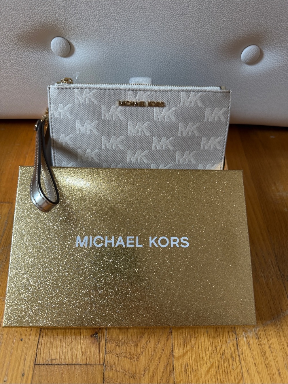 Michael Kors Cream MK Logo Wristlet with Gold Accents